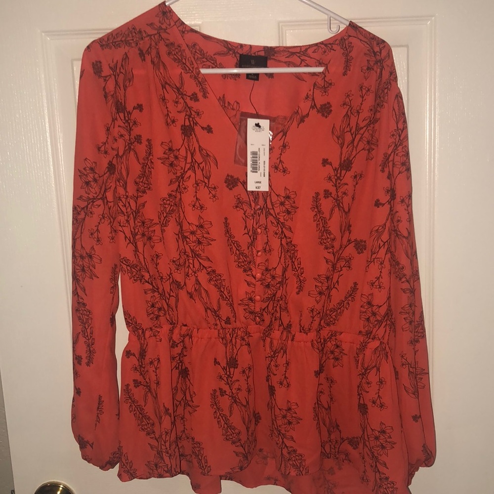 Brand new coral top with floral details
